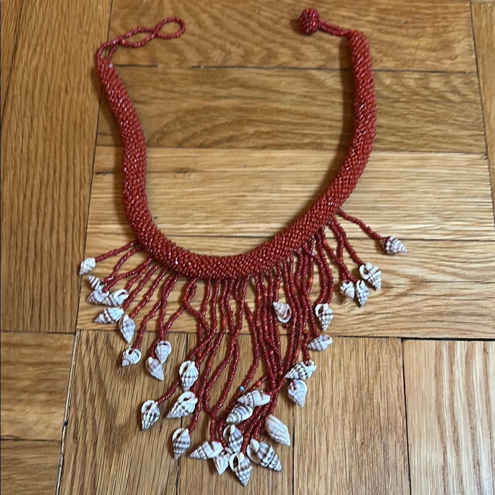 Elegant Red Beaded Necklace with Shell Accents